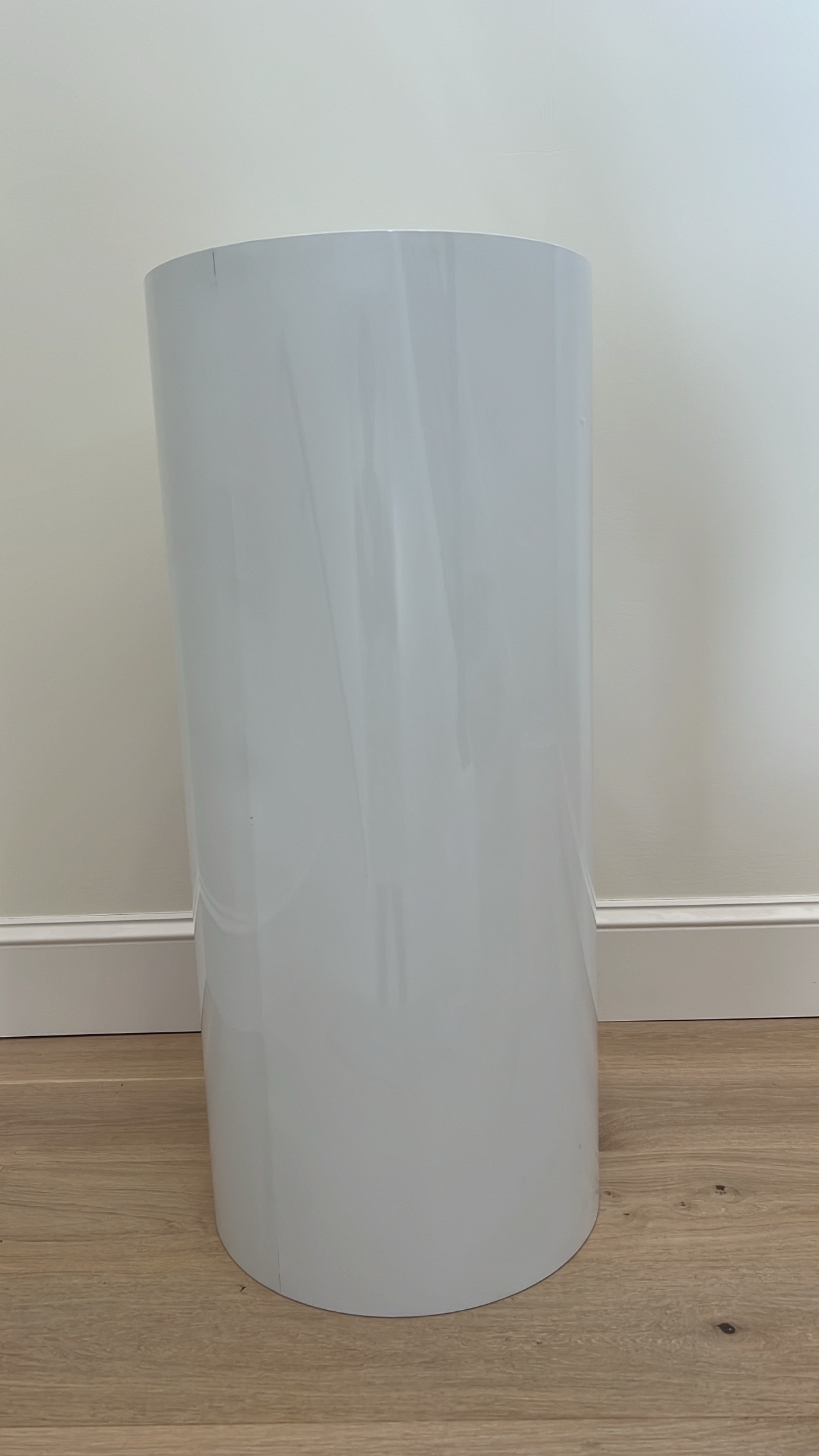 Featured image for “White round pedestal”